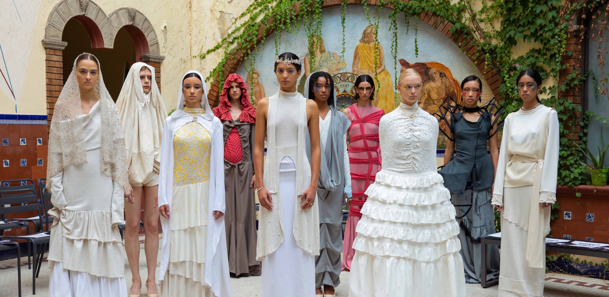 Four Beijing student designers pose with models wearing the garments they created with Naia-blended fabrics.  