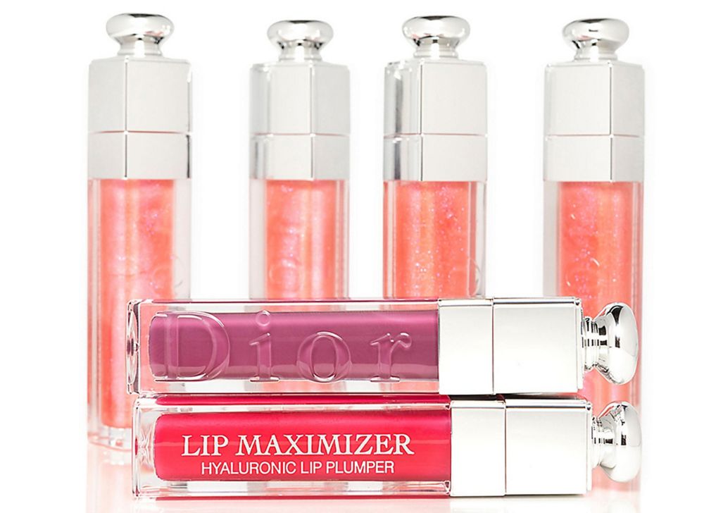Stack of Dior Lip Maximizer lip glosses made from Eastman Cristal Renew. 