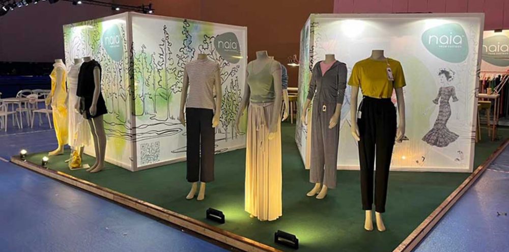 Naia booth clothing displayed 