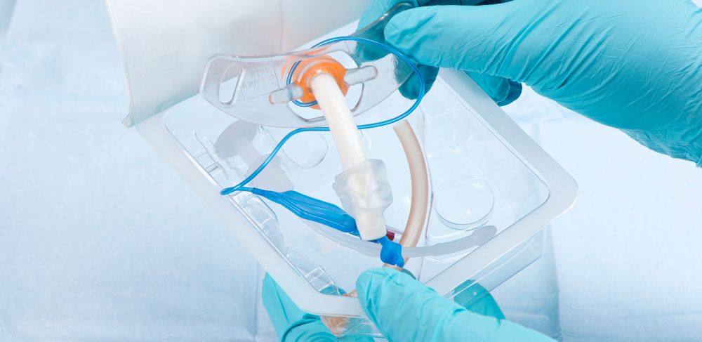 A medical device is removed from its sterile Pacur packaging.