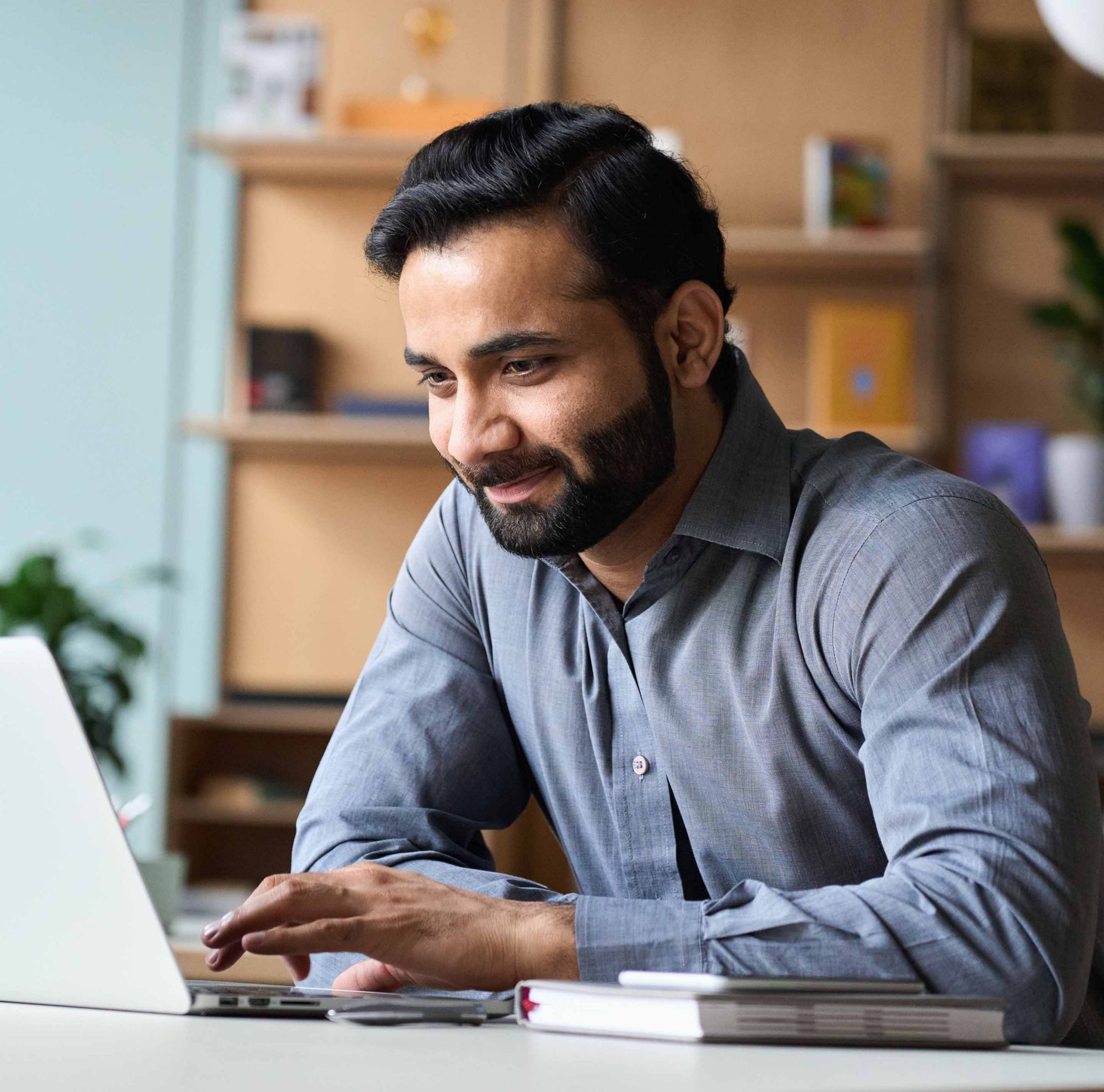 Media professional using his laptop. 