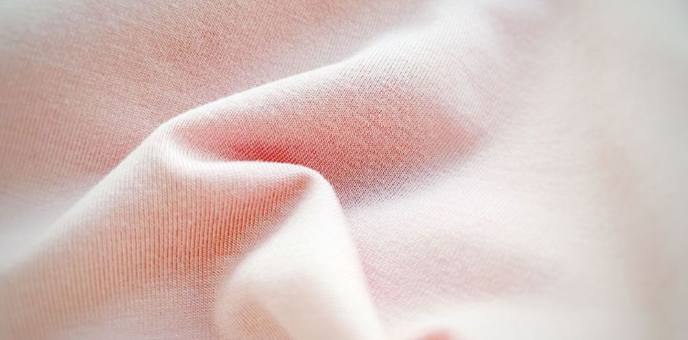 Pink Naia fabric closeup 