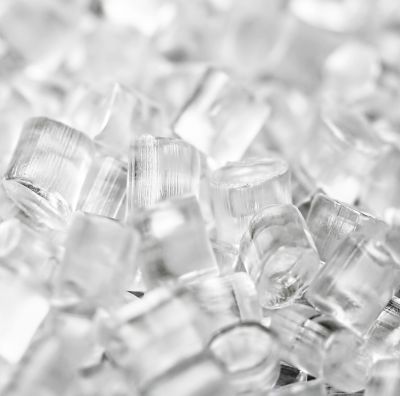 Close-up of clear plastic (PET) granules.
