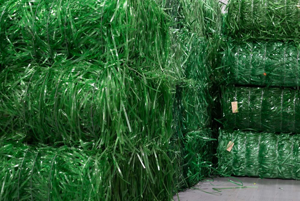 Bales of green plastic strapping. 