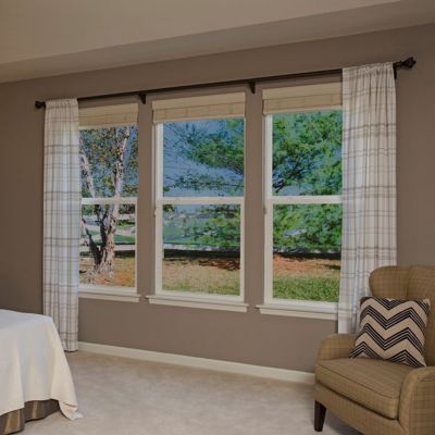 Interior view of Gila® Privacy Control Mirror Window Film in bedroom