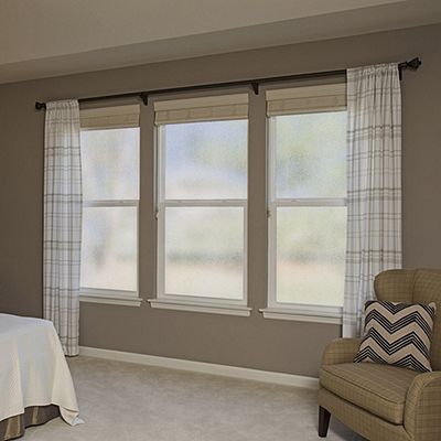 Interior view of Gila® Privacy Control Rice Paper Window Film in bedroom