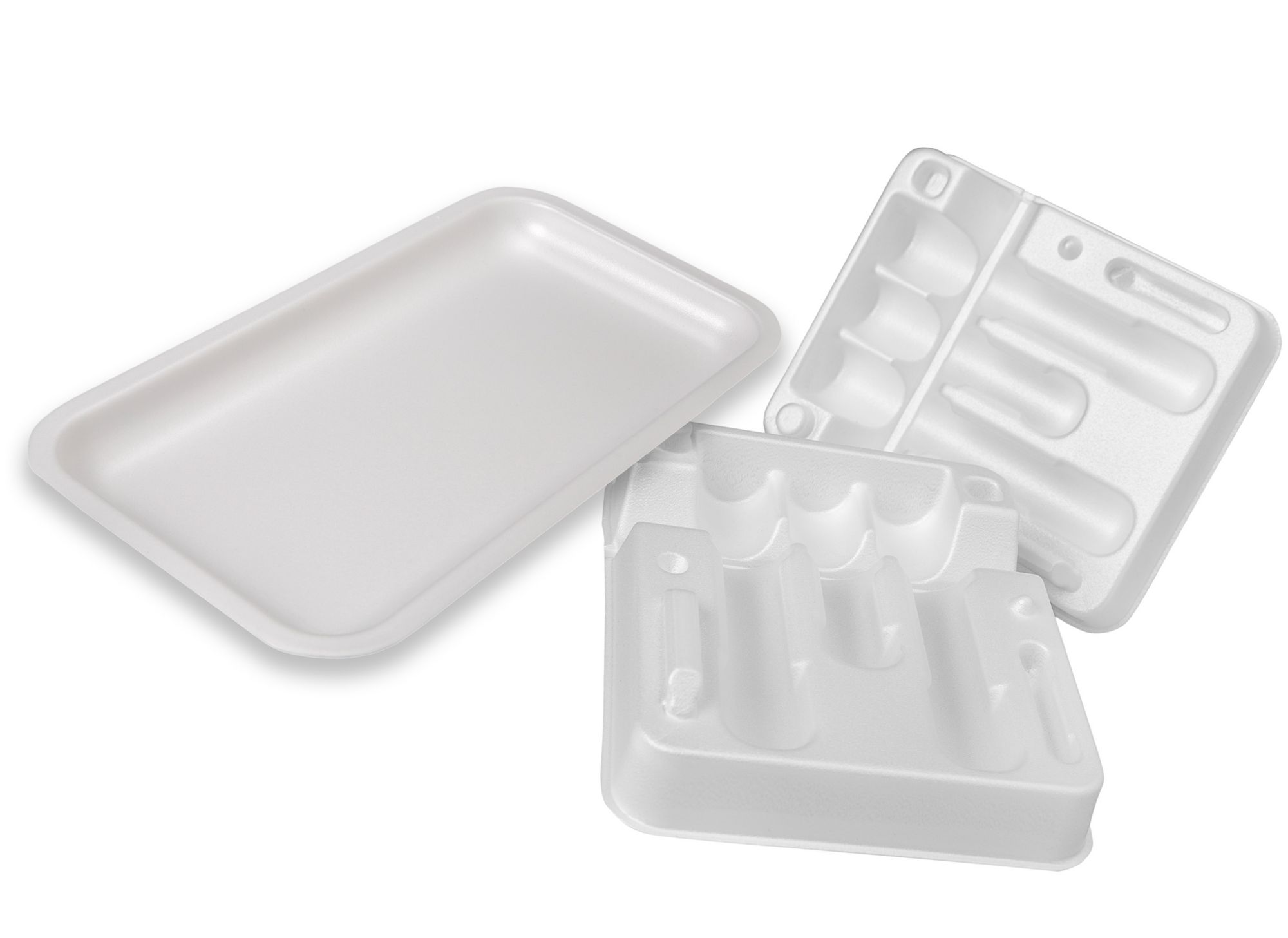 Three rigid, white medical packaging containers. 