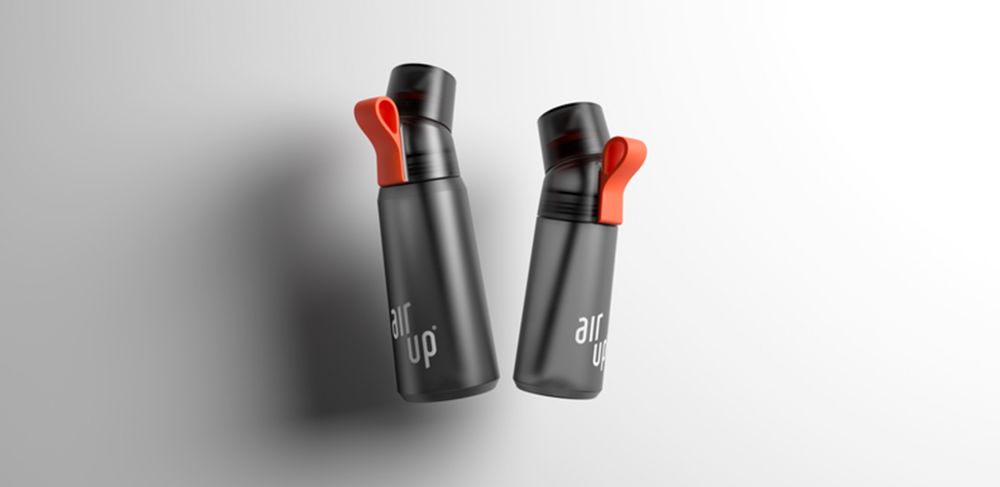 Two charcoal gray air up bottles made from bpa-free Tritan each with an orange strap.  