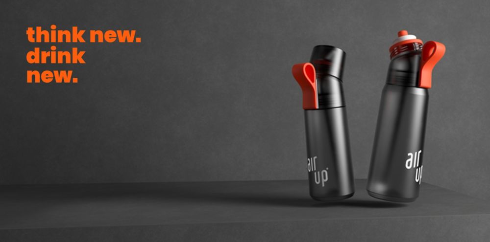 Two floating charcoal gray air up bottles each with orange straps next to text that says "think new. drink new.” 