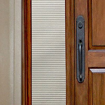 Close up of Gila® Faux Blinds Sidelight Decorative Window Film on front door