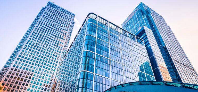 Three skyscrapers as seen from the ground. 