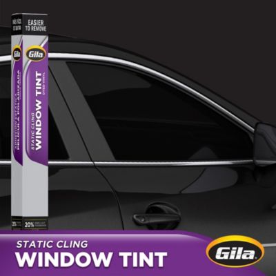 Gila® Static Cling 20% VLT Window Tint packaging in front of car