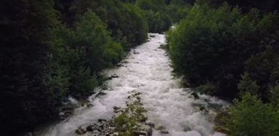 River flowing through mountains.