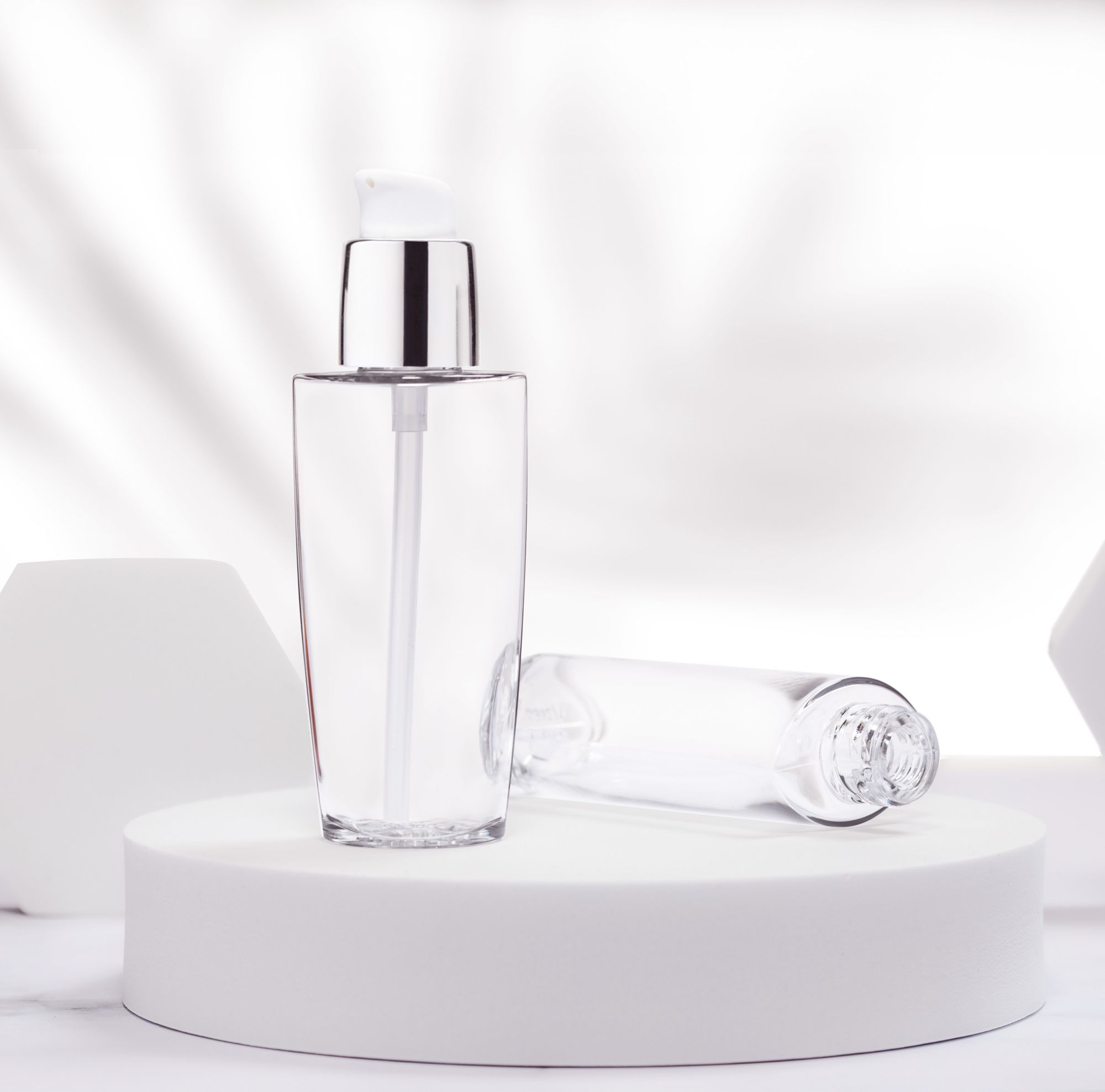 Two clear Cristal bottles 