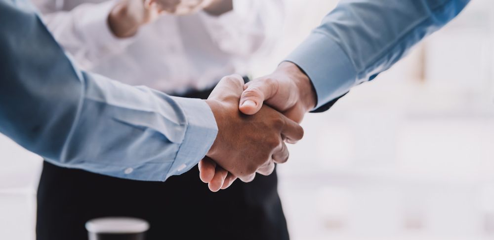 Two people shaking hands