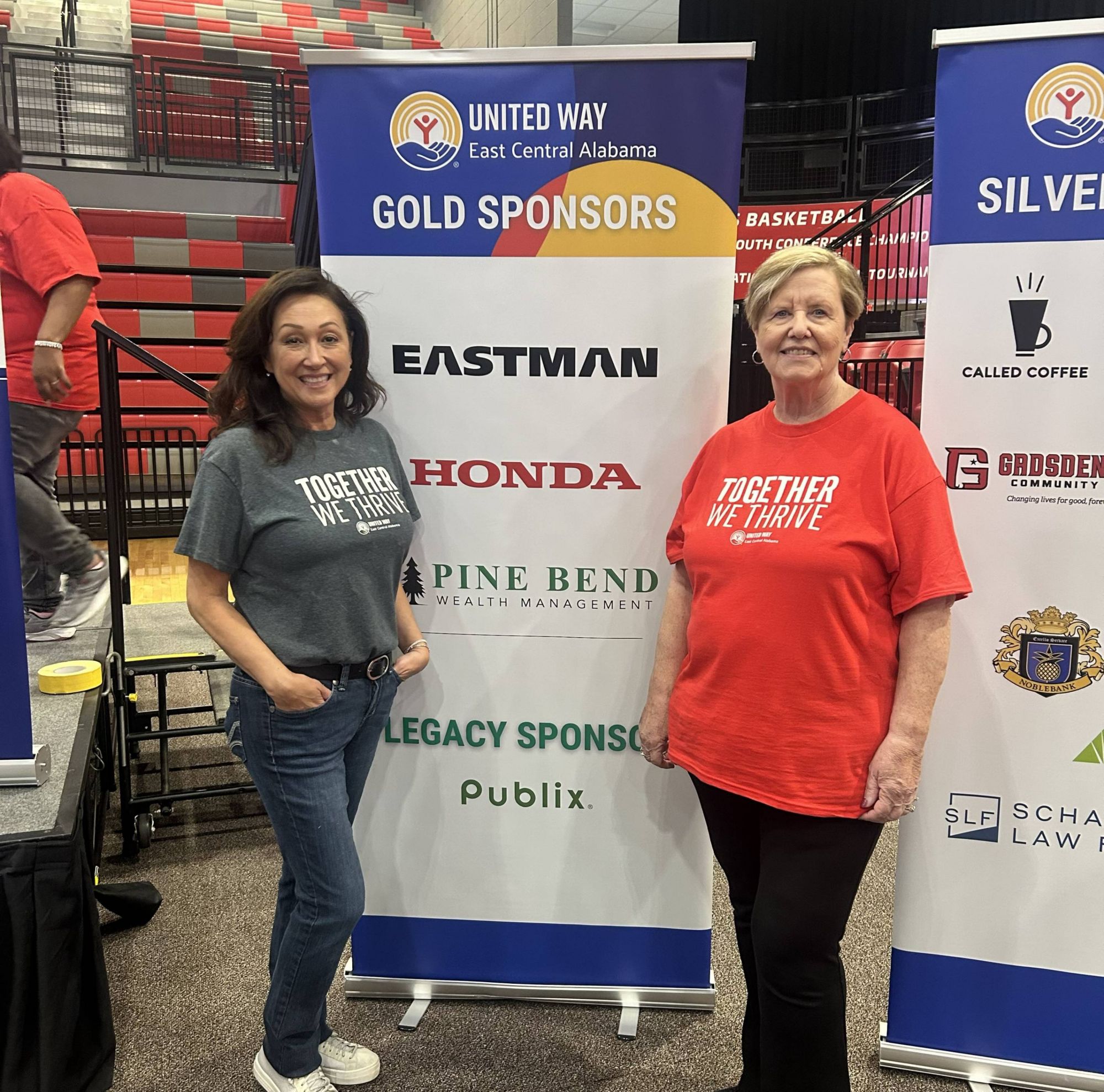 Leaders at Eastman and the United Way present a $15,000 check to Martha’s Hope. 