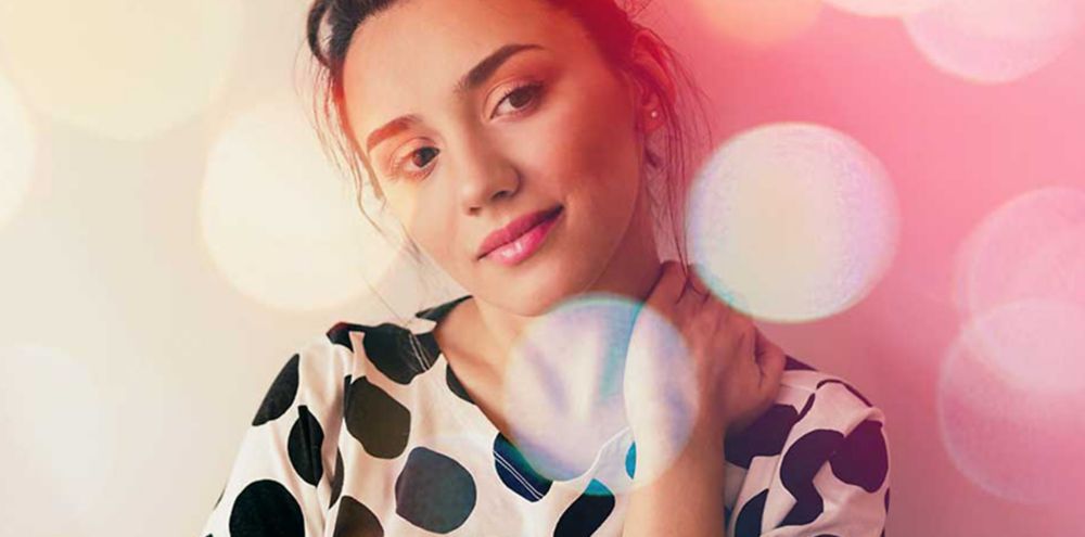 Woman wearing Naia top 