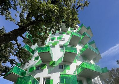 residential building with green balconies