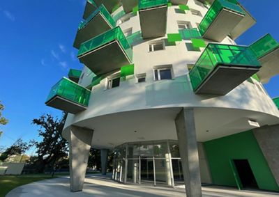 residential building with green balconies