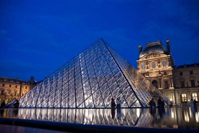 Louvre glass pyramid by night